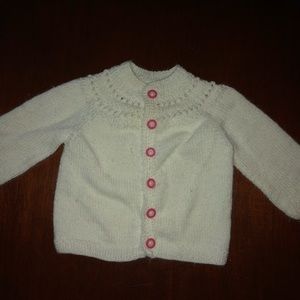 Baby girl sweater made by my aunt